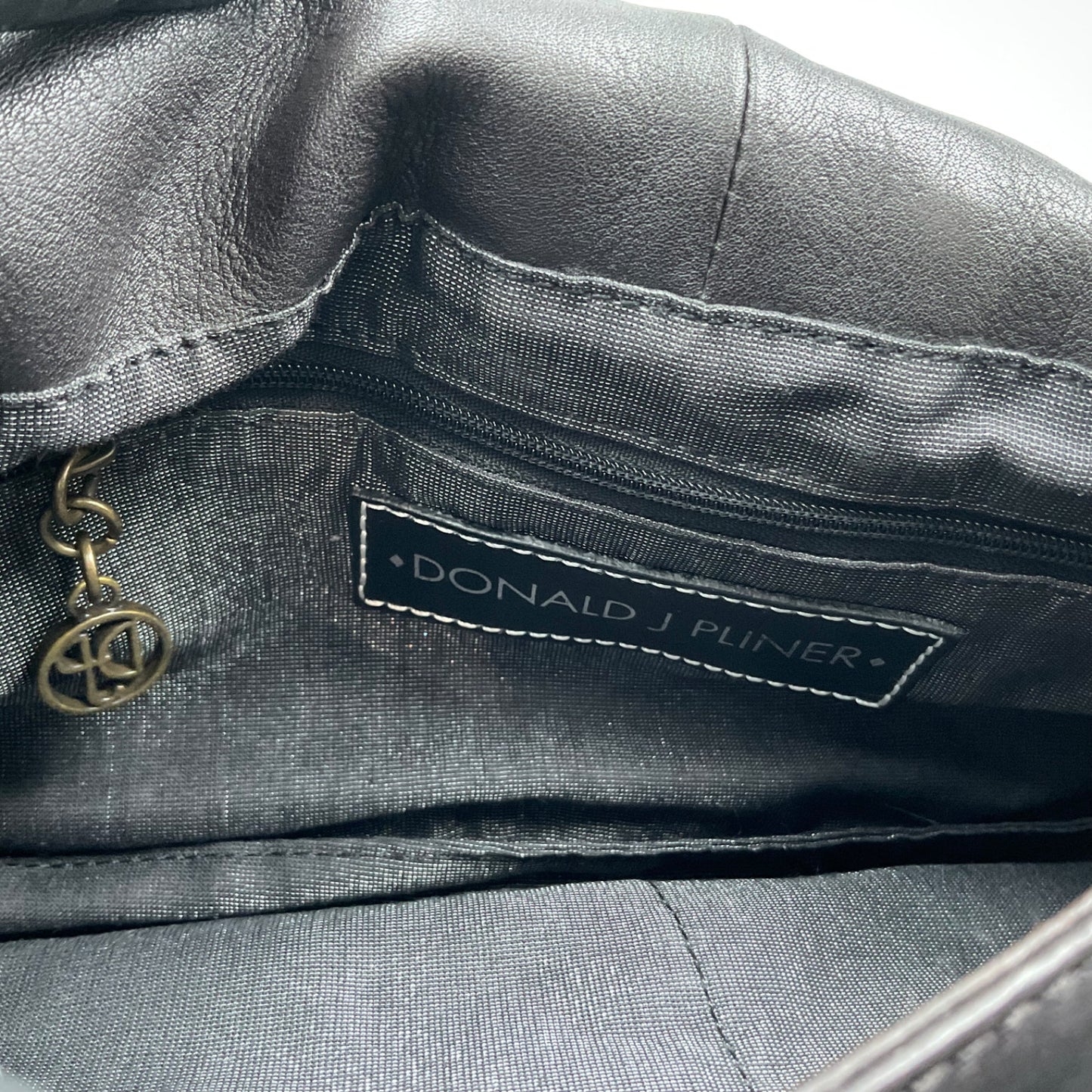 DONALD J. PLINER BLACK LEATHER CLUTCH BAG