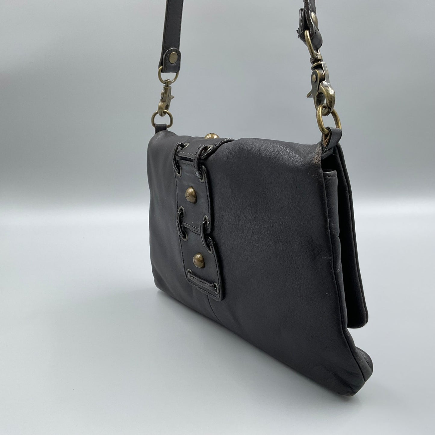 DONALD J. PLINER BLACK LEATHER CLUTCH BAG