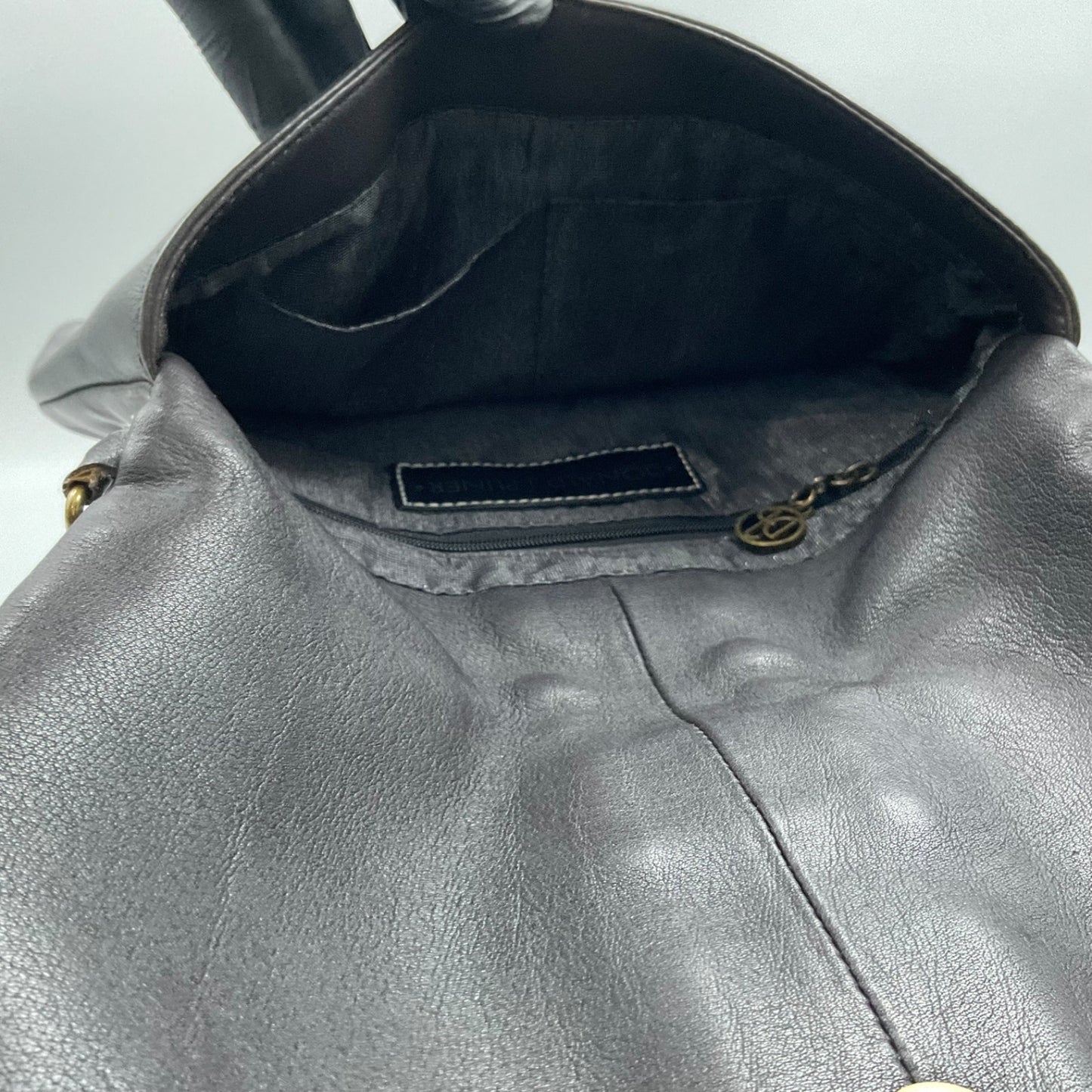 DONALD J. PLINER BLACK LEATHER CLUTCH BAG